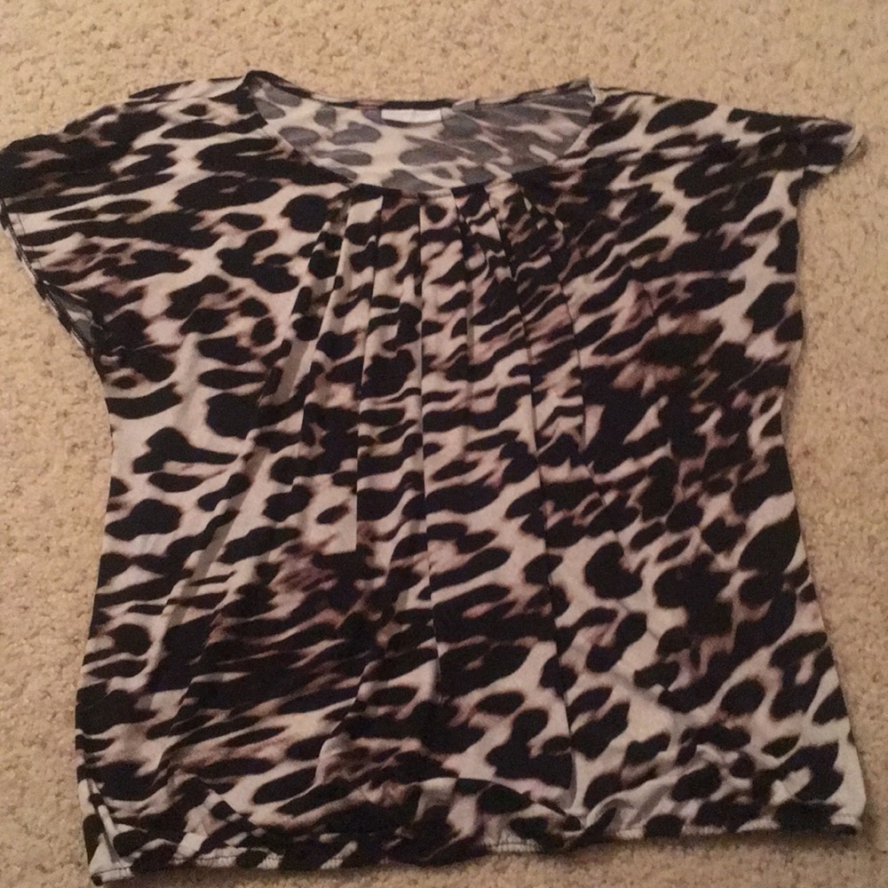 Animal print flutter sleeve top with a bubble hem